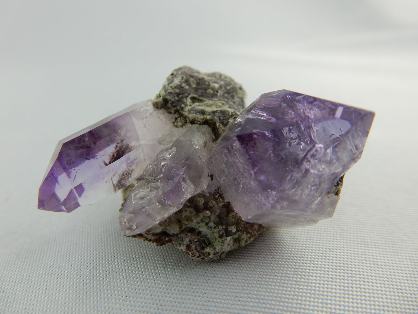 Amethyst with classic deep purple gemmy tips - nice cluster on matrix