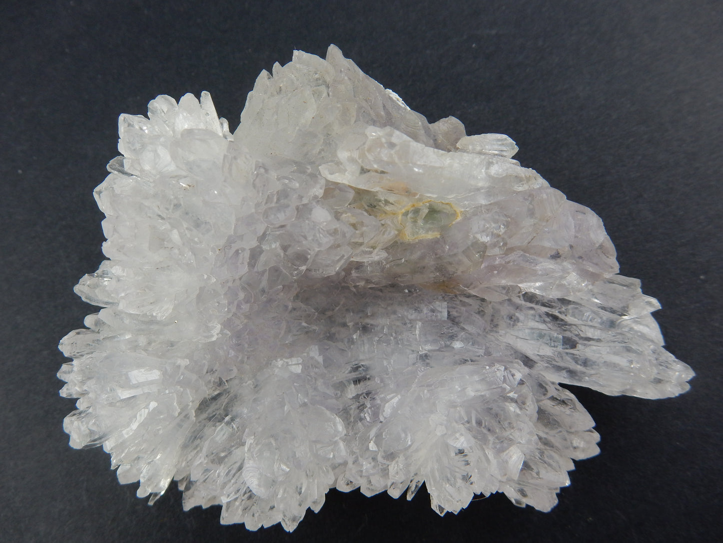 formed in the "lava tubes" of Amethyst caves, often attached as separate flowers of amethyst