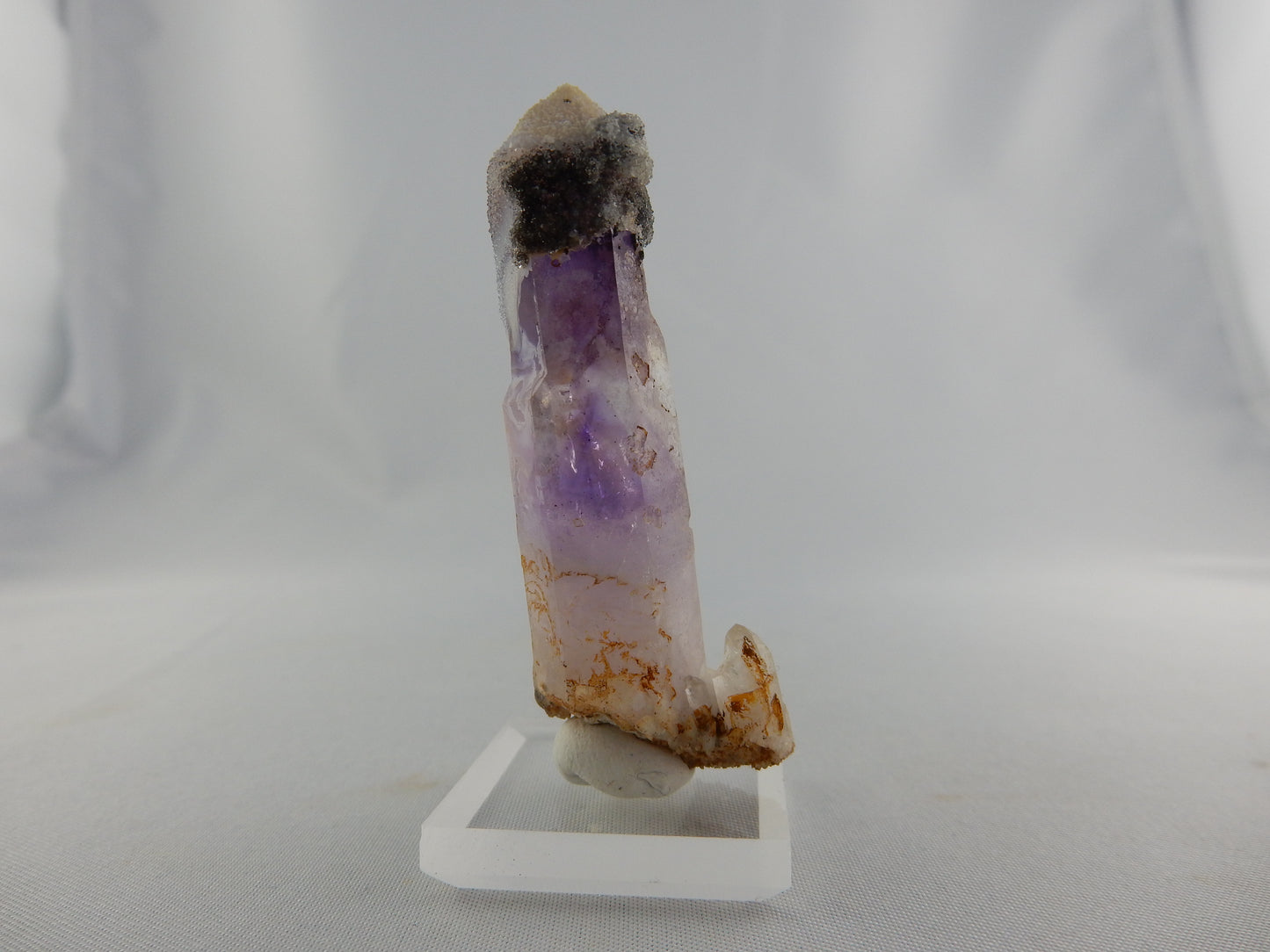 Weird terminated point of altered Goosamebebe quartz - amethyst phantom and secondary growths on exterio