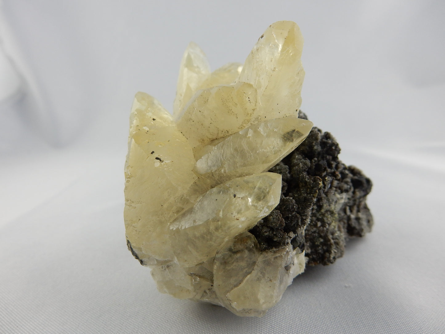 classic benchmark calcite from Elmwood Mine USA - 10+ gemmy terminations on matrix