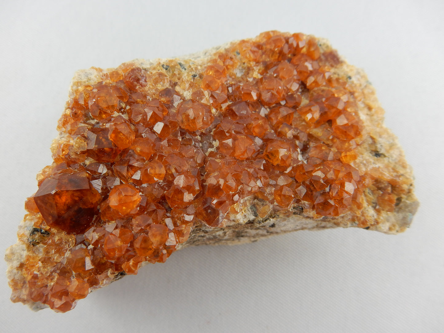 gemmy sparkly orange crystal garnet cluster from the famous locale of Tongbei, China