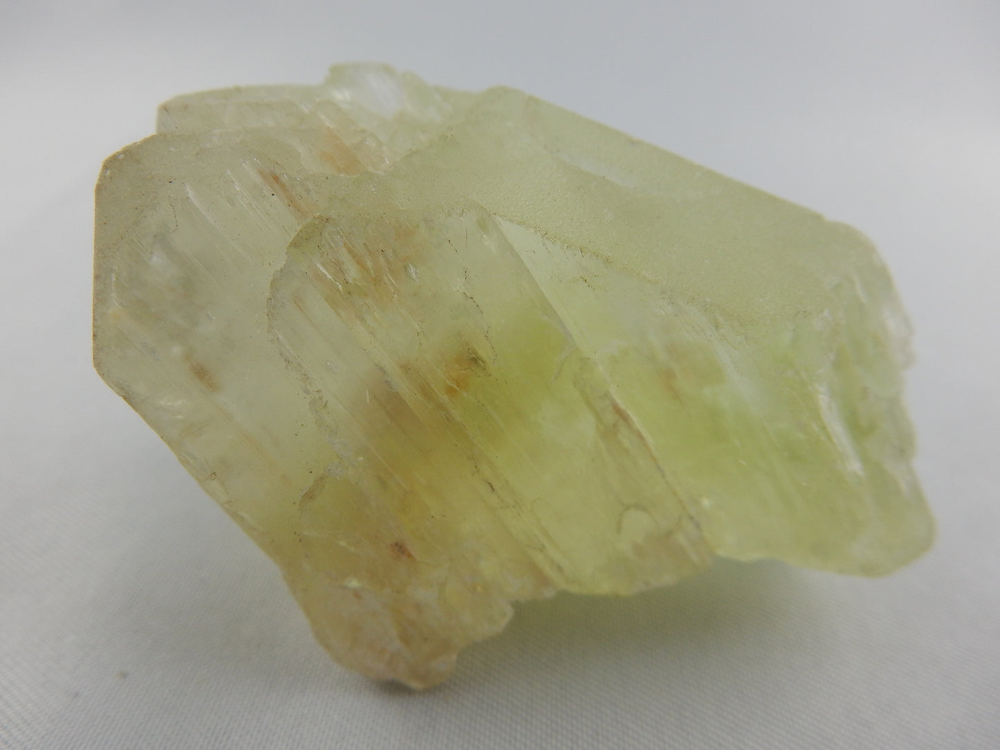 large and perfect yellow-green Kunzite - "mountain termination"