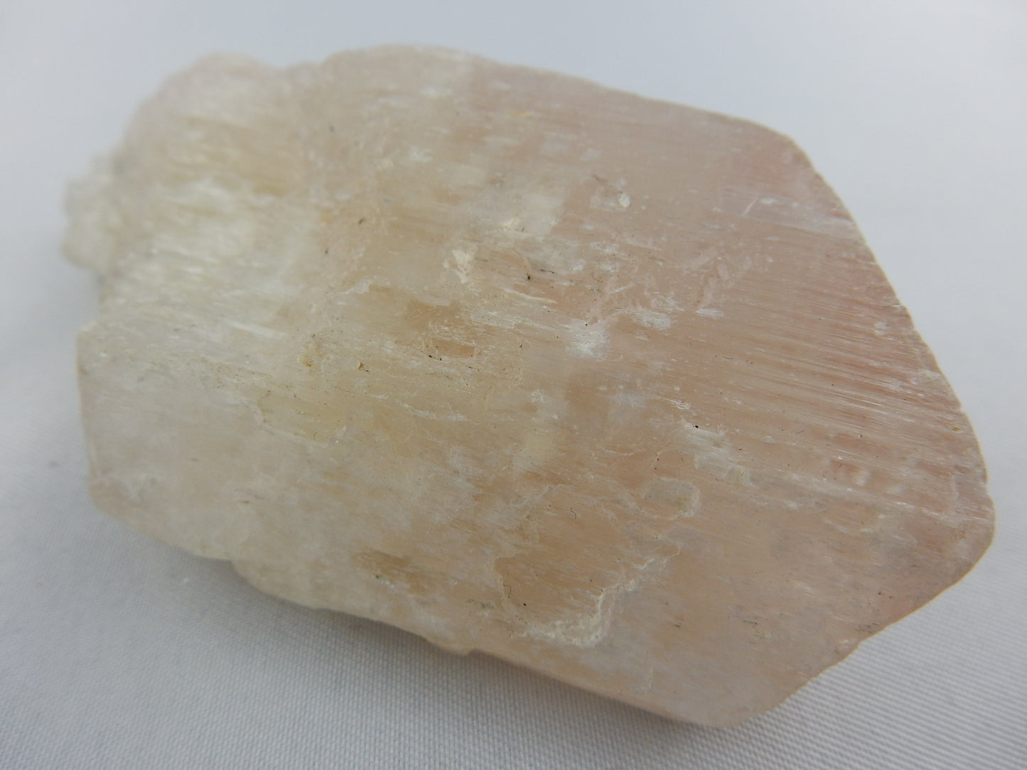 very large Kunzite, classic V-shaped termination, unique etched faces