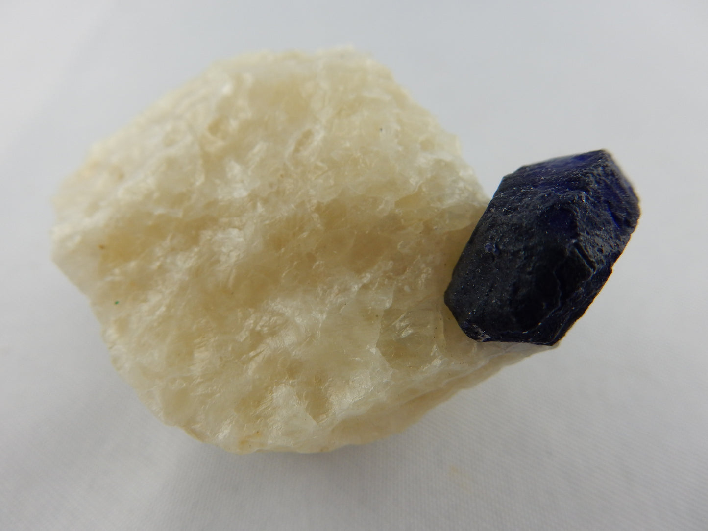 Lazurite Crystal on Marble
