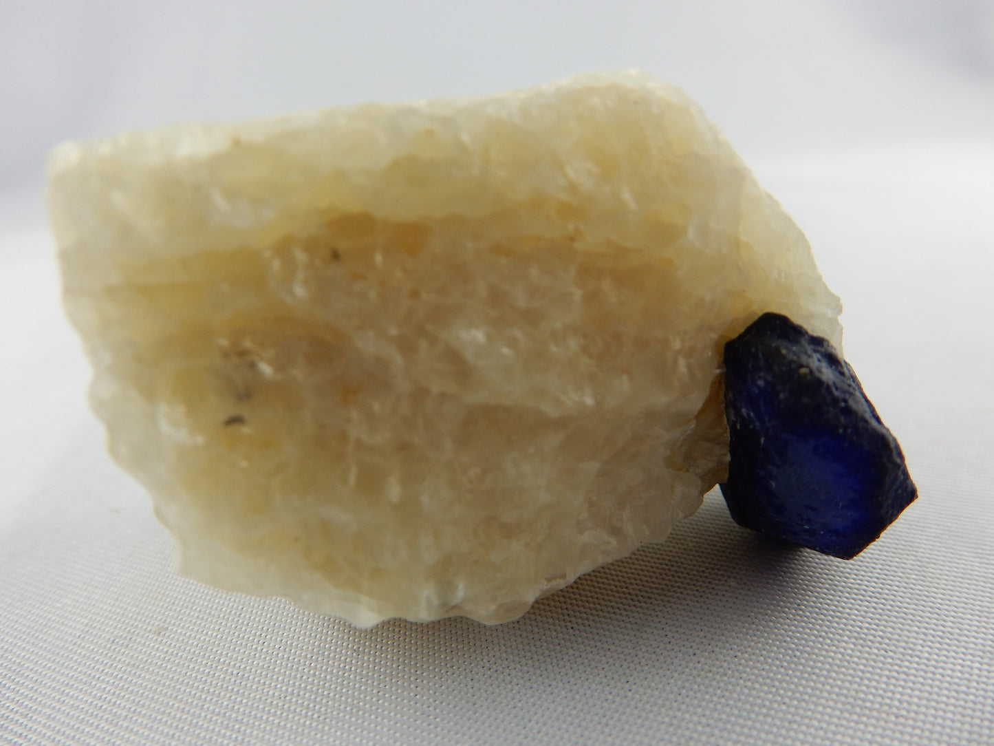 Lazurite Crystal on Marble