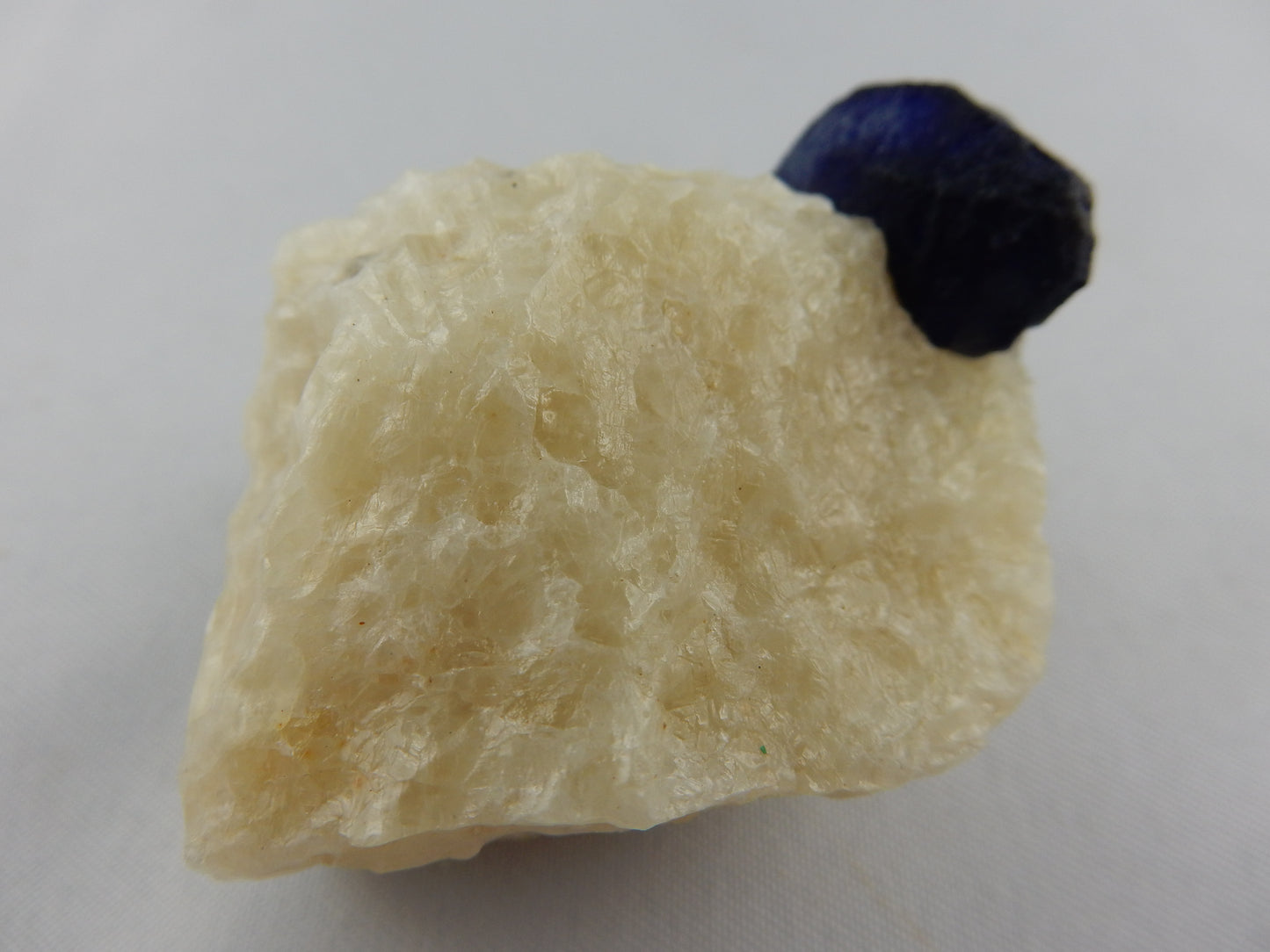 Lazurite Crystal on Marble