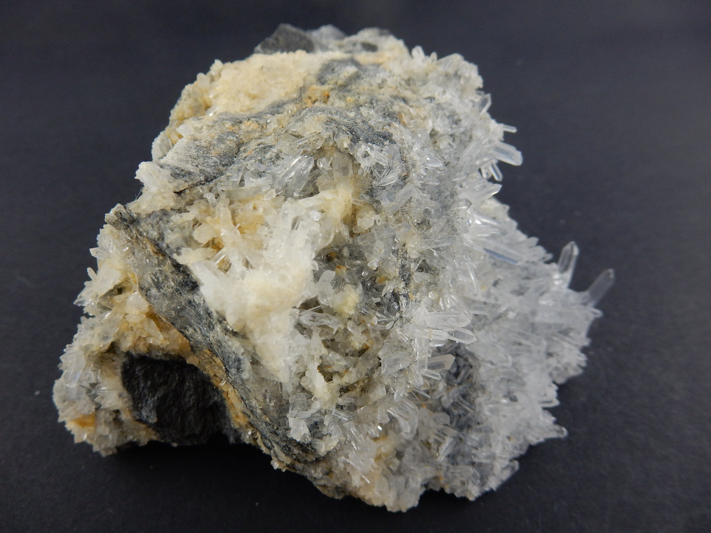 Delicate "needle" quartz clusters on semi-metallic matrix