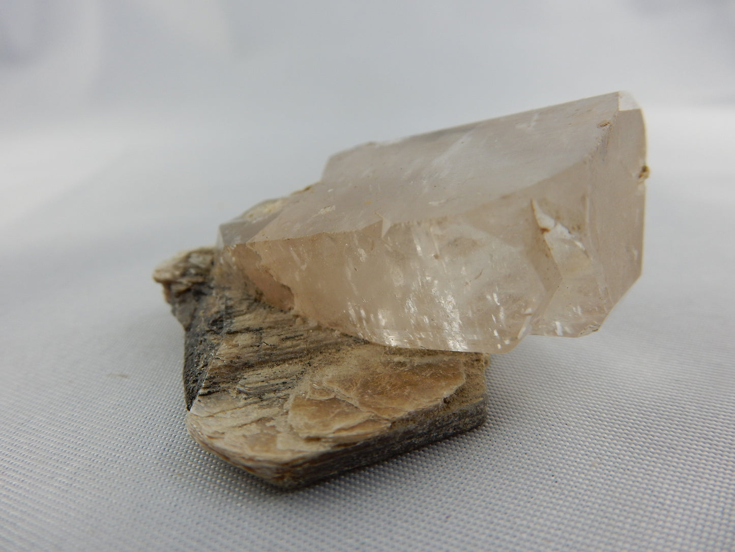 Topaz - large blocky complete terminations, classic amber, on plate of muscovite