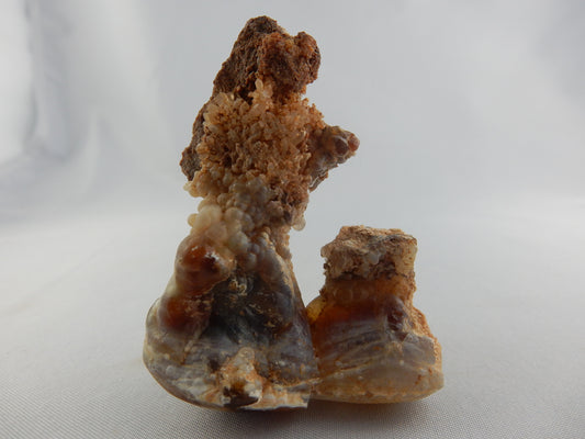 Nicely polished "seam" of rich orange-yellow-white agate - would make nice necklace