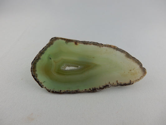 polished gemmy slab of full round of agate - green hollow center