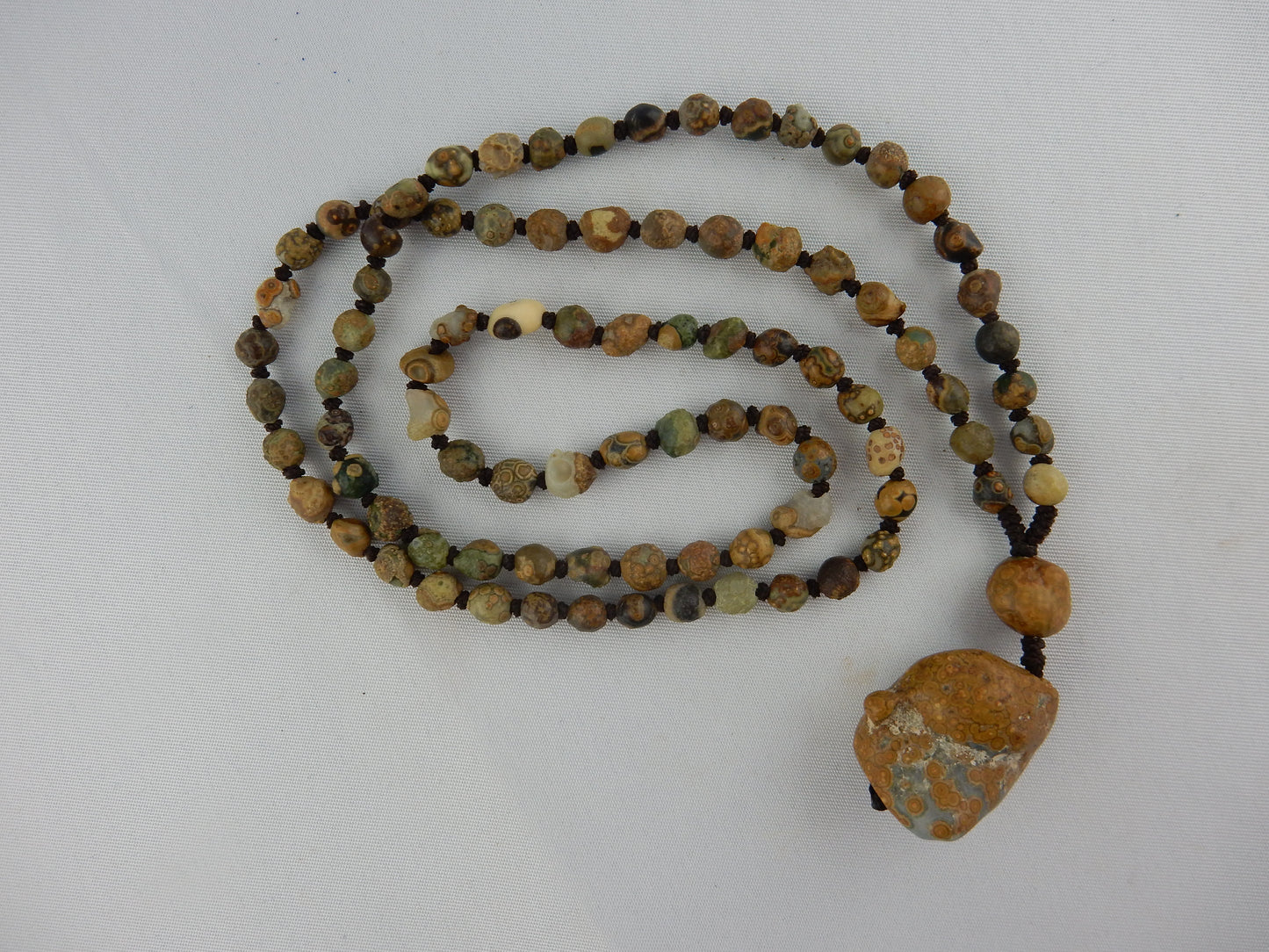 Natural Gobi desert polished tiny interesting beads with larger end-piece Agate