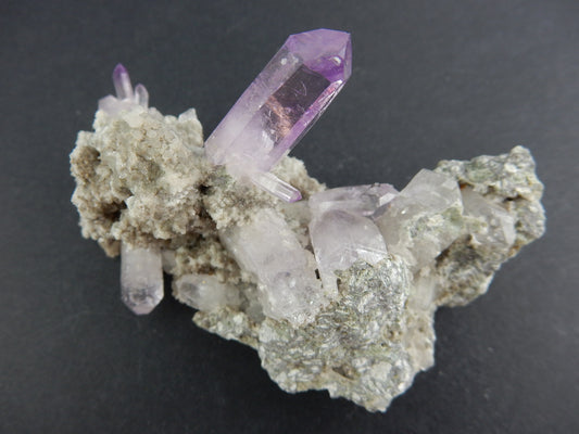 awesome cluster of classic Vera Cruz - one big gemmy purple crystal and many others to show off - sits perfect