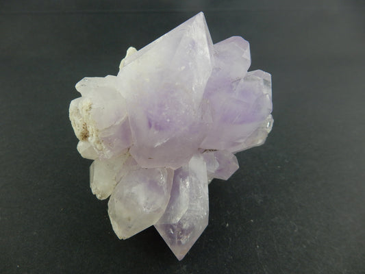 Amethyst cluster with nice pale purple phantoms in a cluster of gemmy-milky points