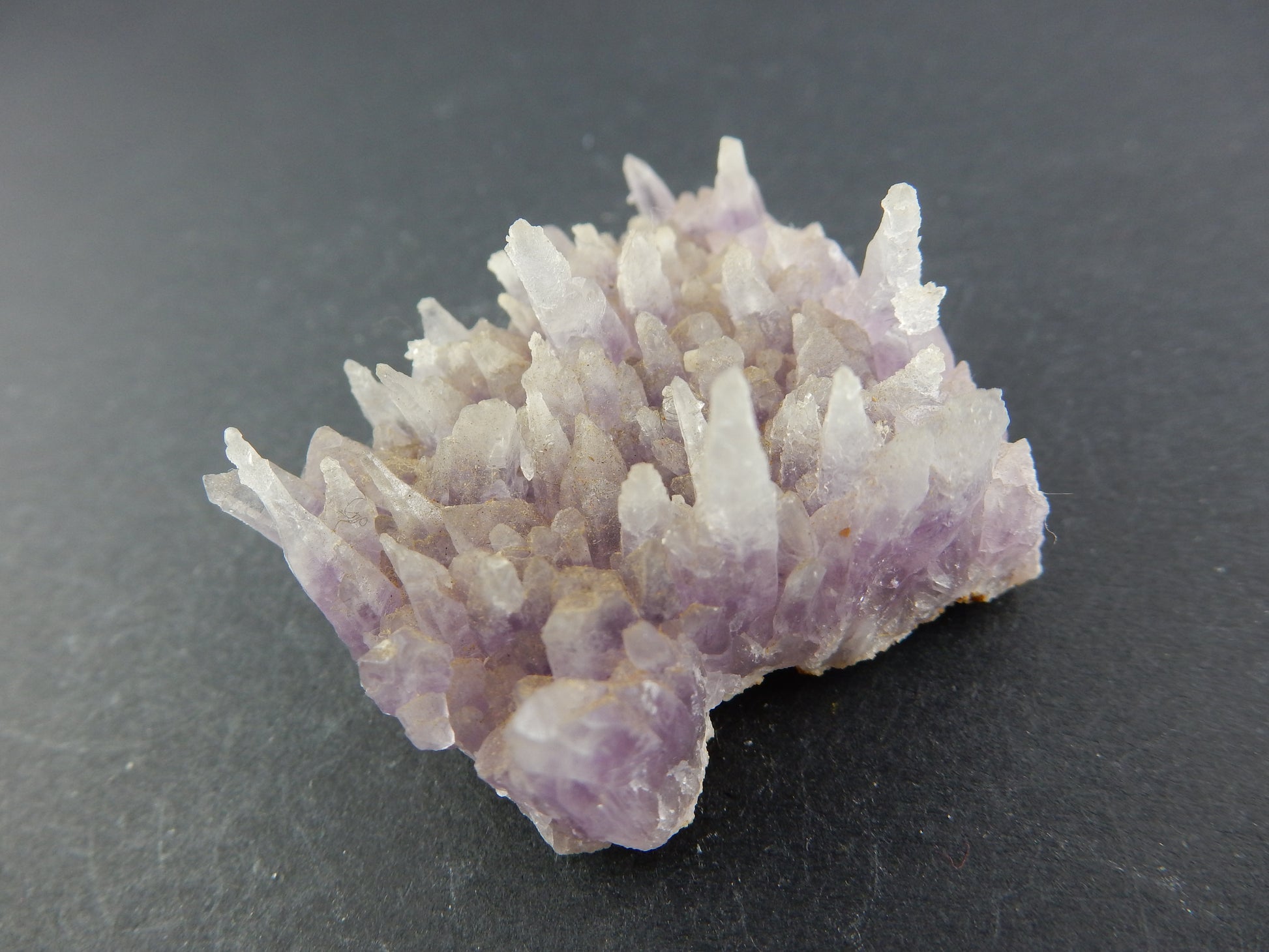 Rare formation of amethyst - sharp "needles" on a plate