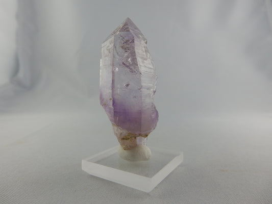 Gemmy perfect terminated point of classic Goosamebebe quartz with smokey amethyst phantom