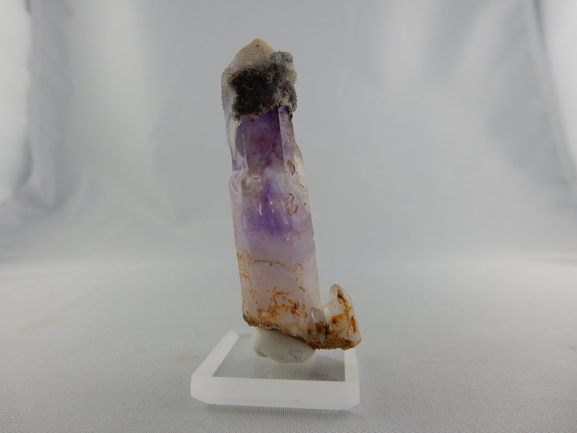 Weird terminated point of altered Goosamebebe quartz - amethyst phantom and secondary growths on exterio
