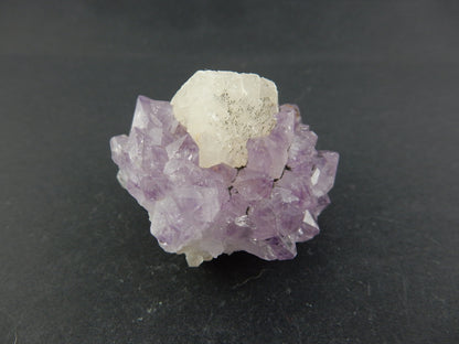 Amethyst with perfect Calcite Cube