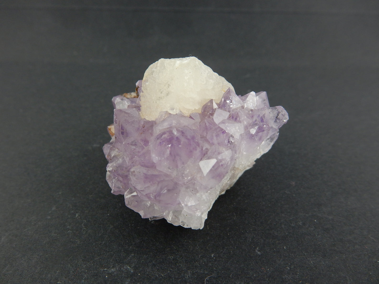 Amethyst with perfect Calcite Cube