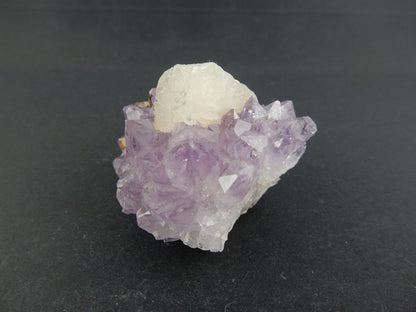 Amethyst with perfect Calcite Cube