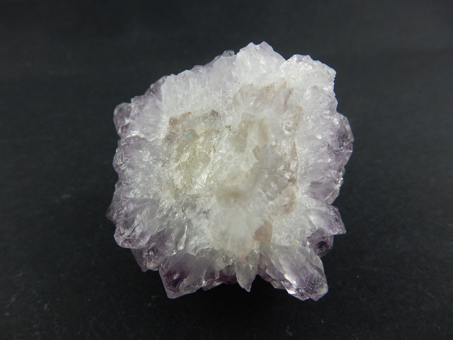 Amethyst with perfect Calcite Cube