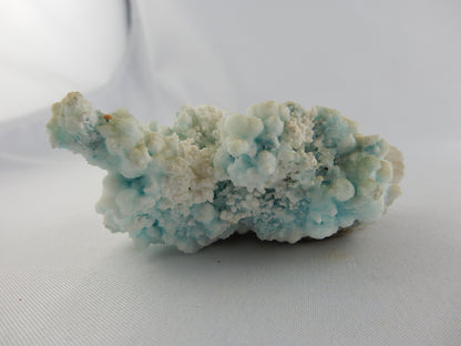Delicate "snow aragonite" with white/blue cave growths