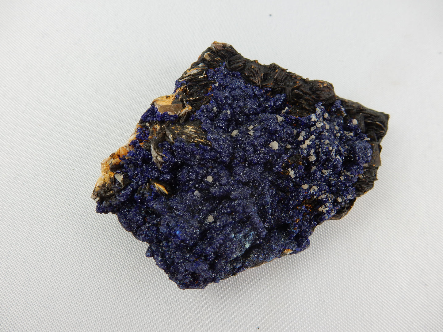 Sparkly dark blue plate of Azurite crystals