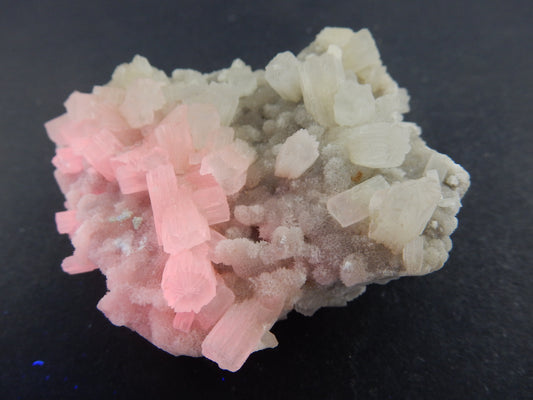 Plate of terminated columnar calcite - look ordinary enough, but strong orange UV - one of brightest you would ever see