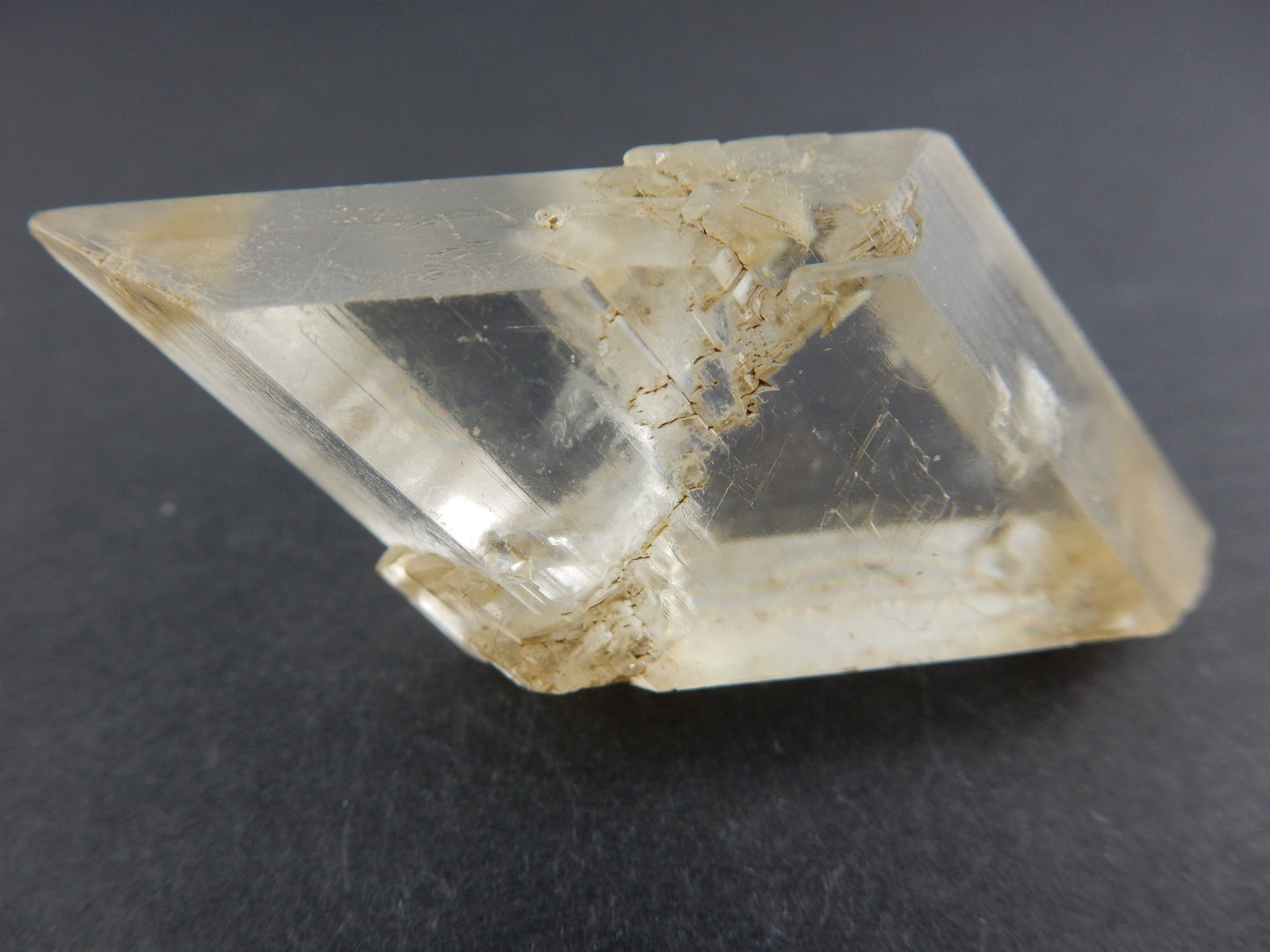 water clear modified cubo crystals cluster growing on darker base