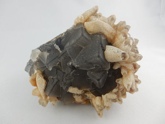 Heavy purple-green fluorite core with termination, smothered with barite and quartz terminated "hedgehog" points