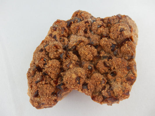 Big plate of gemmy points of "root-beer" coloured fluorite, smothered by barite(?) and quartz on bed of quartz