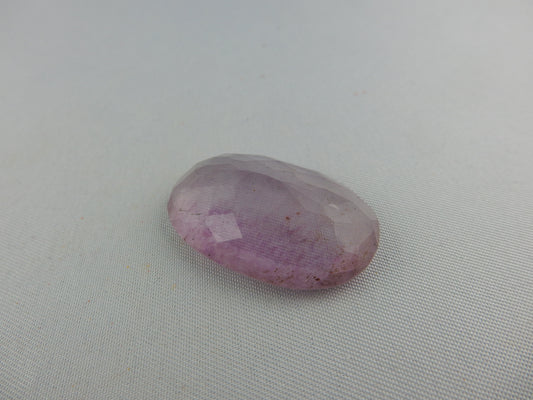 faceted cab of gemmy purple-blue-yellow banded fluorite