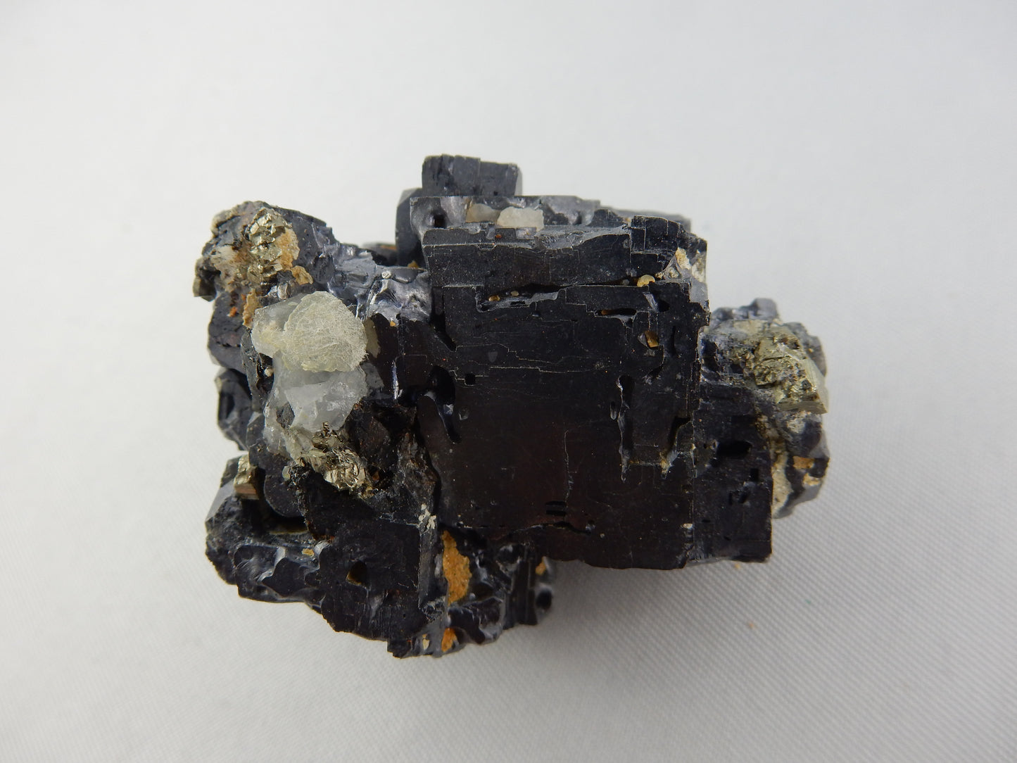 Weird and rare "hoppered" modified crystal cluster of shiny galena, with minor pyrite attached
