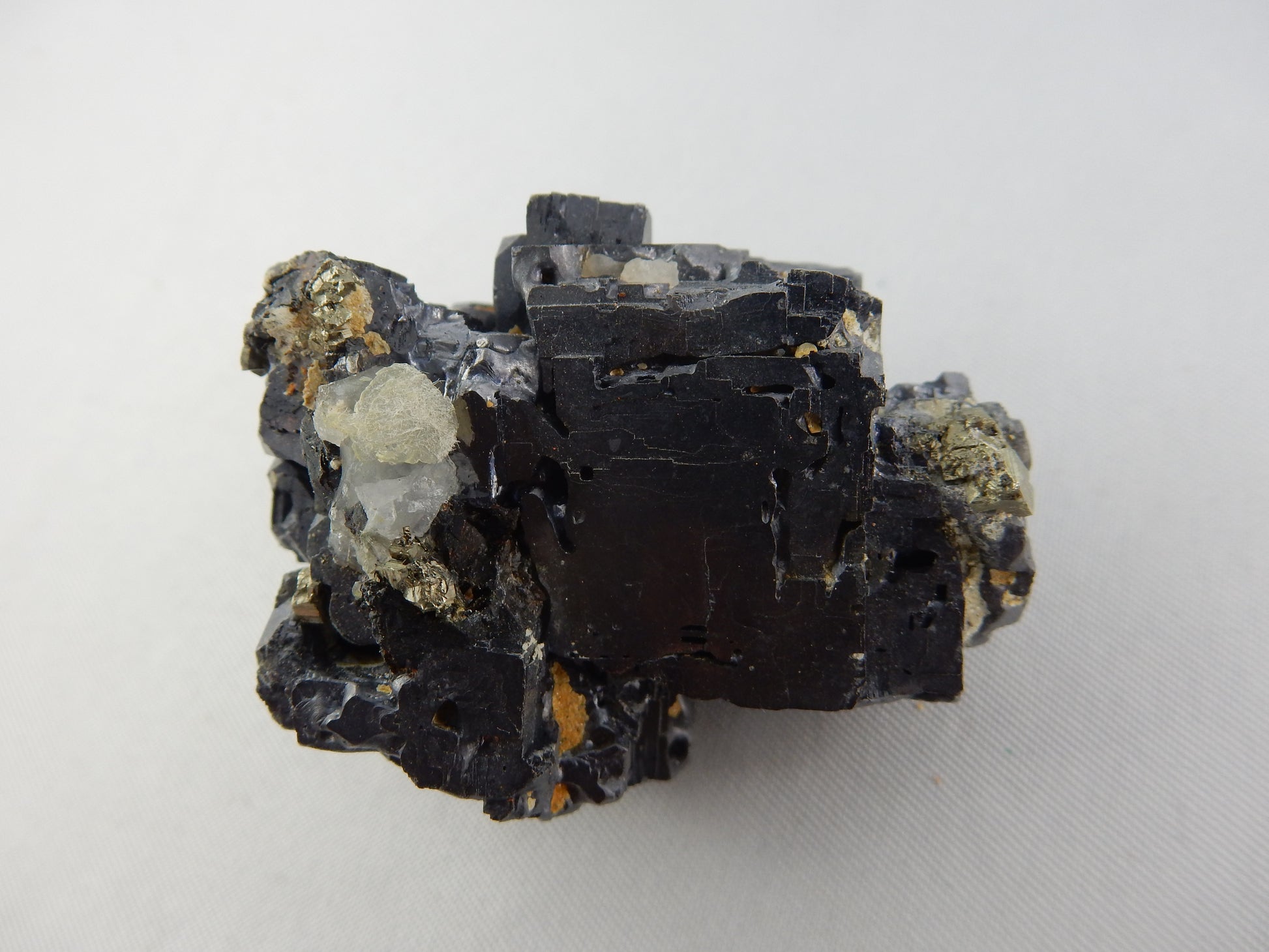 Weird and rare "hoppered" modified crystal cluster of shiny galena, with minor pyrite attached