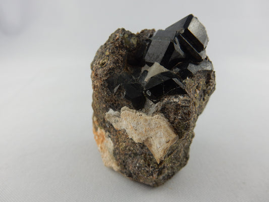 gemmy flashy black terminated cluster of garnet