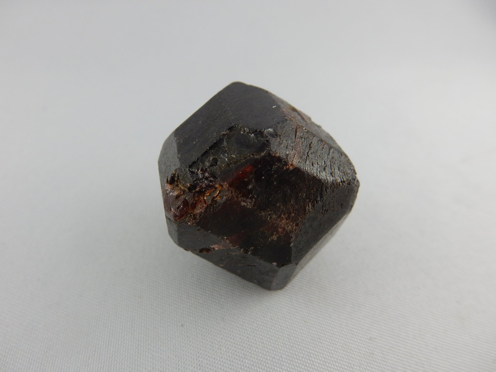 Perfect "Floater" Crystal "model dodecahedron" (natural-unpolished) with modified edge extra faces - dark red-brown gemmy