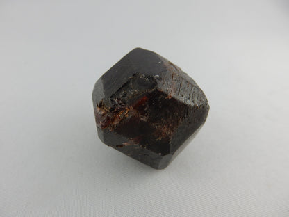 Perfect "Floater" Crystal "model dodecahedron" (natural-unpolished) with modified edge extra faces - dark red-brown gemmy