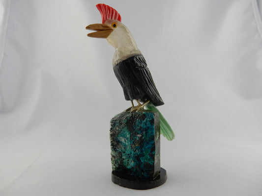 red agate crest, quartz head, black onyx body, green adventurine tail - perched on chrysocolla base
