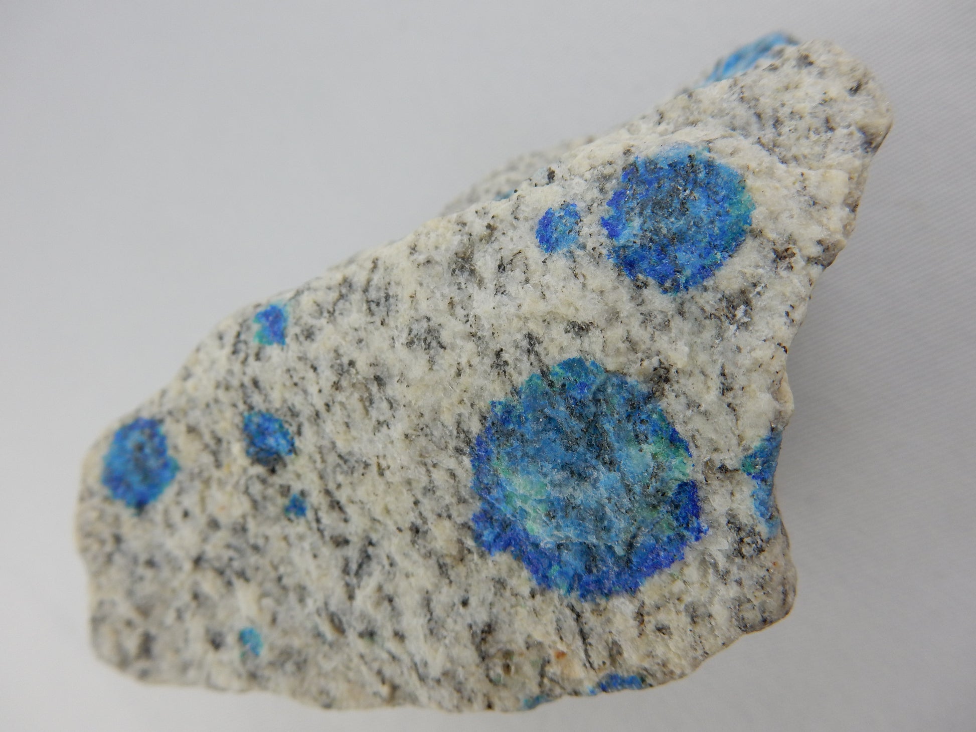 rare rough specimen of this unique rock - azurite spots on while granite gneiss - from K2 mountain area
