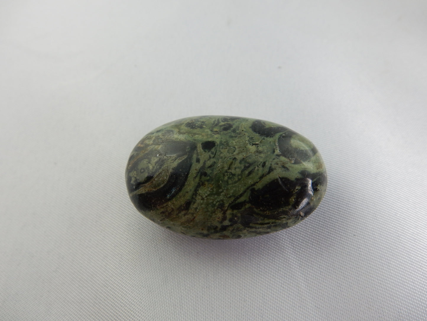 Amazing patterns of stromatlites fossils? or volcanic jasper? - nice palm stone regardless!