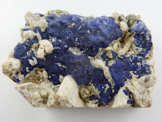 well-prepared specimen of "pre-cooked" lapis lazuli - Lazurite crystals on base of calclite and pyrite sprinkles