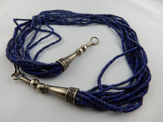 amazing 10-stand 1mm braid of hand-made natural Lapis Lazuli beads with silver clasps in a necklace