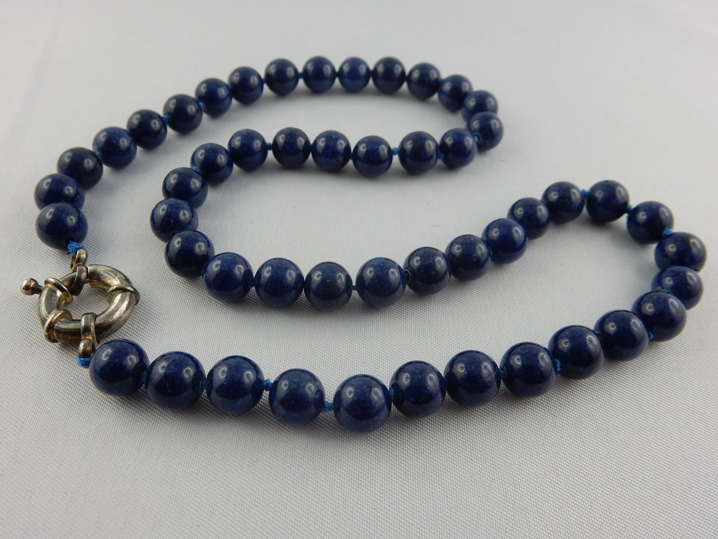 deep blue AAA+ quality round beaded Lapis Lazuli necklace with silver clasps