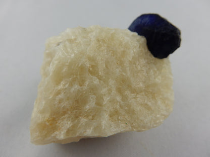Lazurite Crystal on Marble