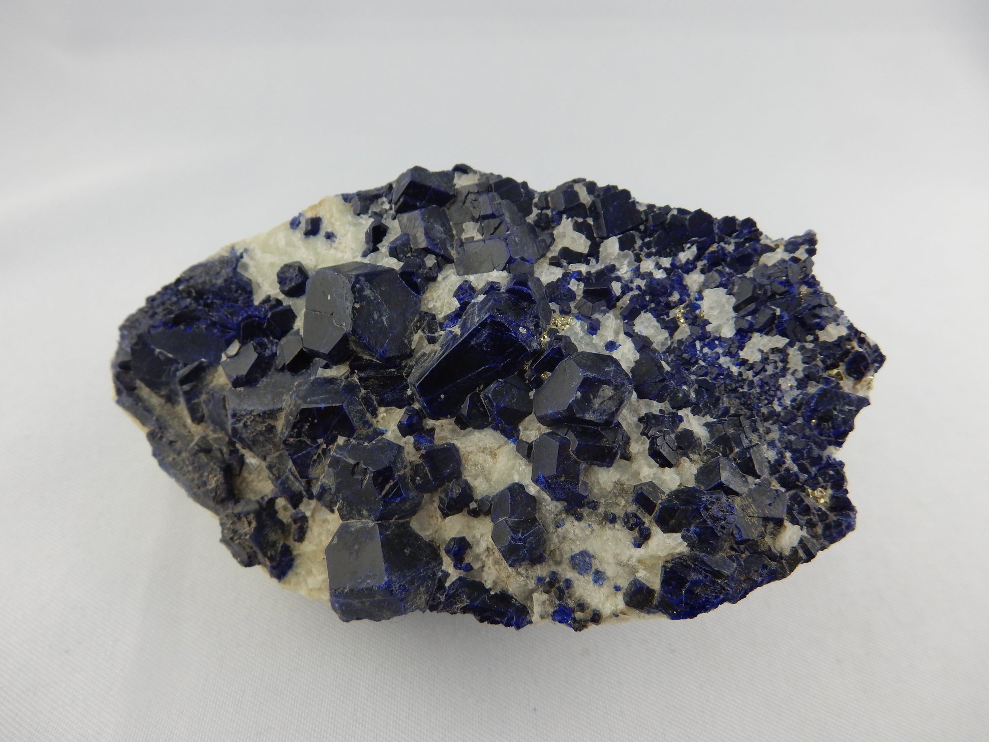 Stunning specimen of dark blue sharply terminated Lazurites on bed of calcite streaked with pyrite and BRIGHT YELLOW UV "Lemon-Fire" Wernerite-Scapolite !!!