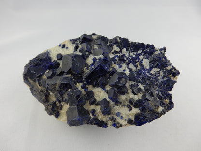 Stunning specimen of dark blue sharply terminated Lazurites on bed of calcite streaked with pyrite and BRIGHT YELLOW UV "Lemon-Fire" Wernerite-Scapolite !!!