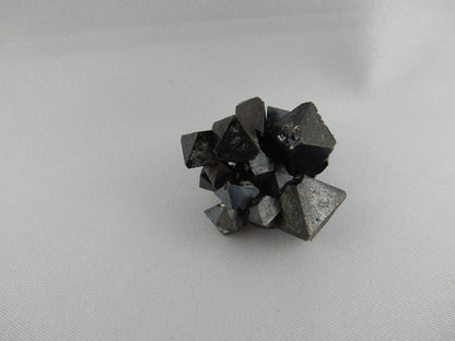 natural octahedral crystals of magnetite - strongly magnetic as a fun unique cluster!