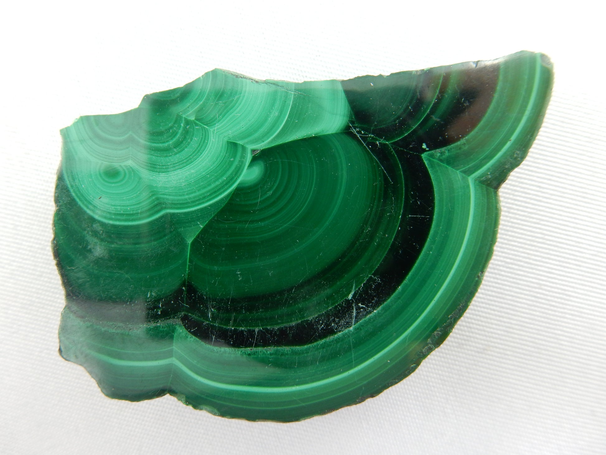 intense deep green Malachite - almost black stalactite formations on double sided polished slab