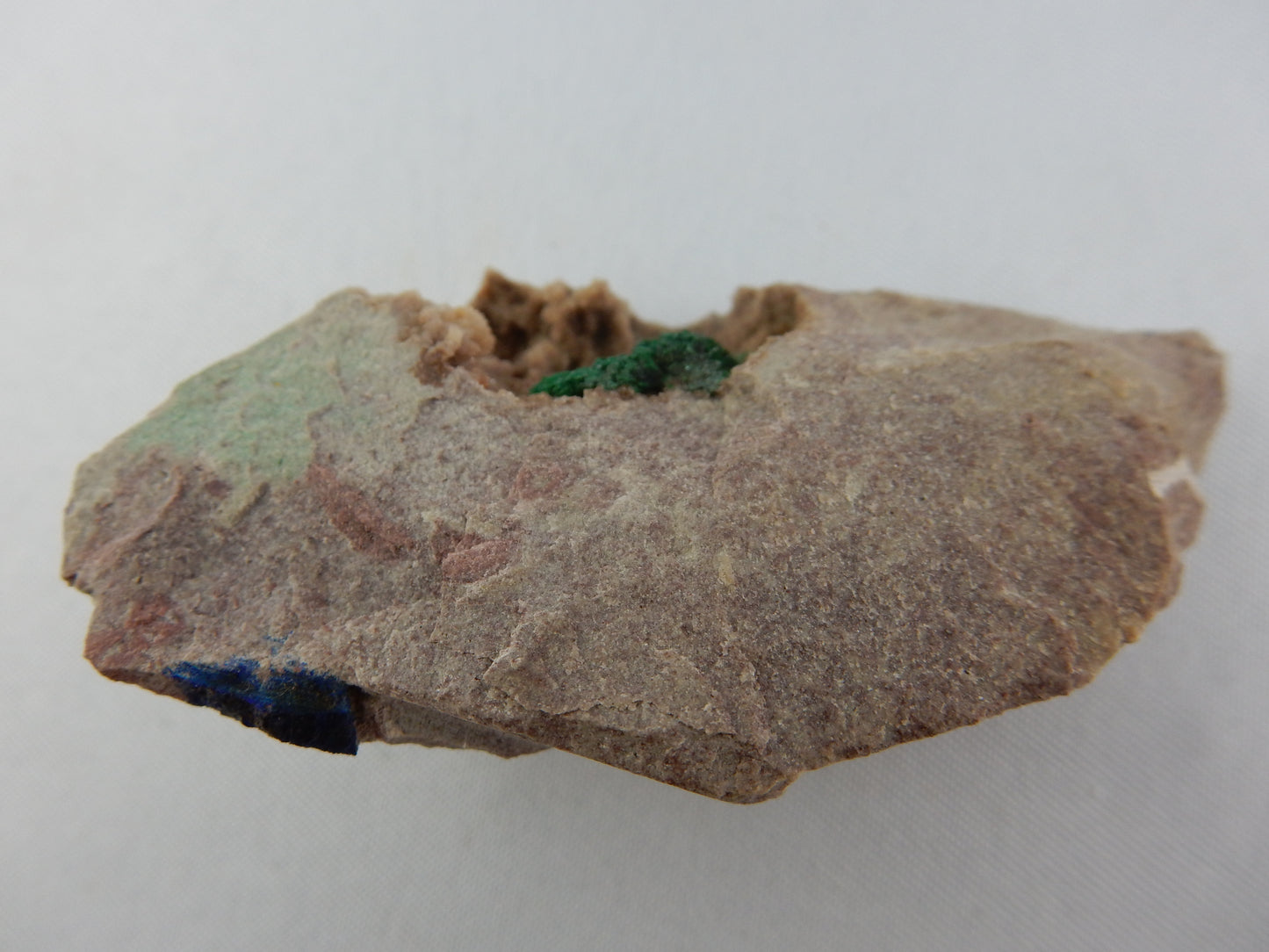 Rare bright green shiny malachite acicular "spray" crystal in vug of dolomite matrix - with its minor brother blue azurite