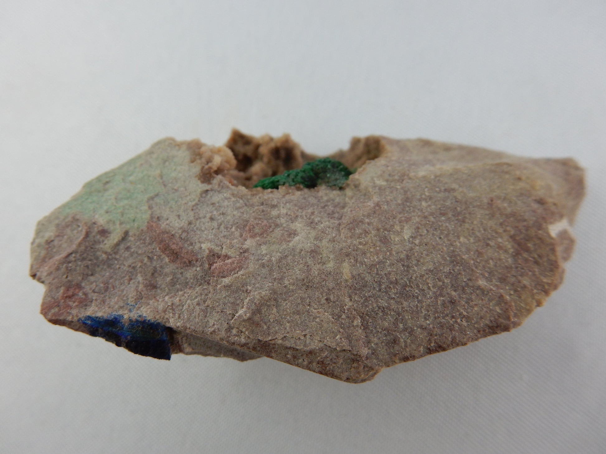Rare bright green shiny malachite acicular "spray" crystal in vug of dolomite matrix - with its minor brother blue azurite