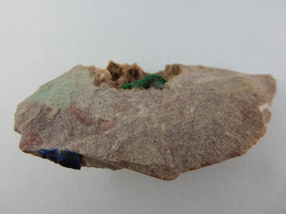 Rare bright green shiny malachite acicular "spray" crystal in vug of dolomite matrix - with its minor brother blue azurite